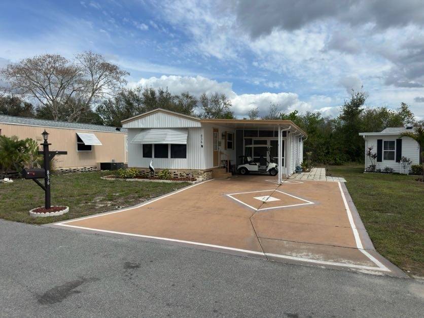 Winter Haven, FL Mobile Home for Sale located at 836 Sandtrap Circle Hidden Golf Club